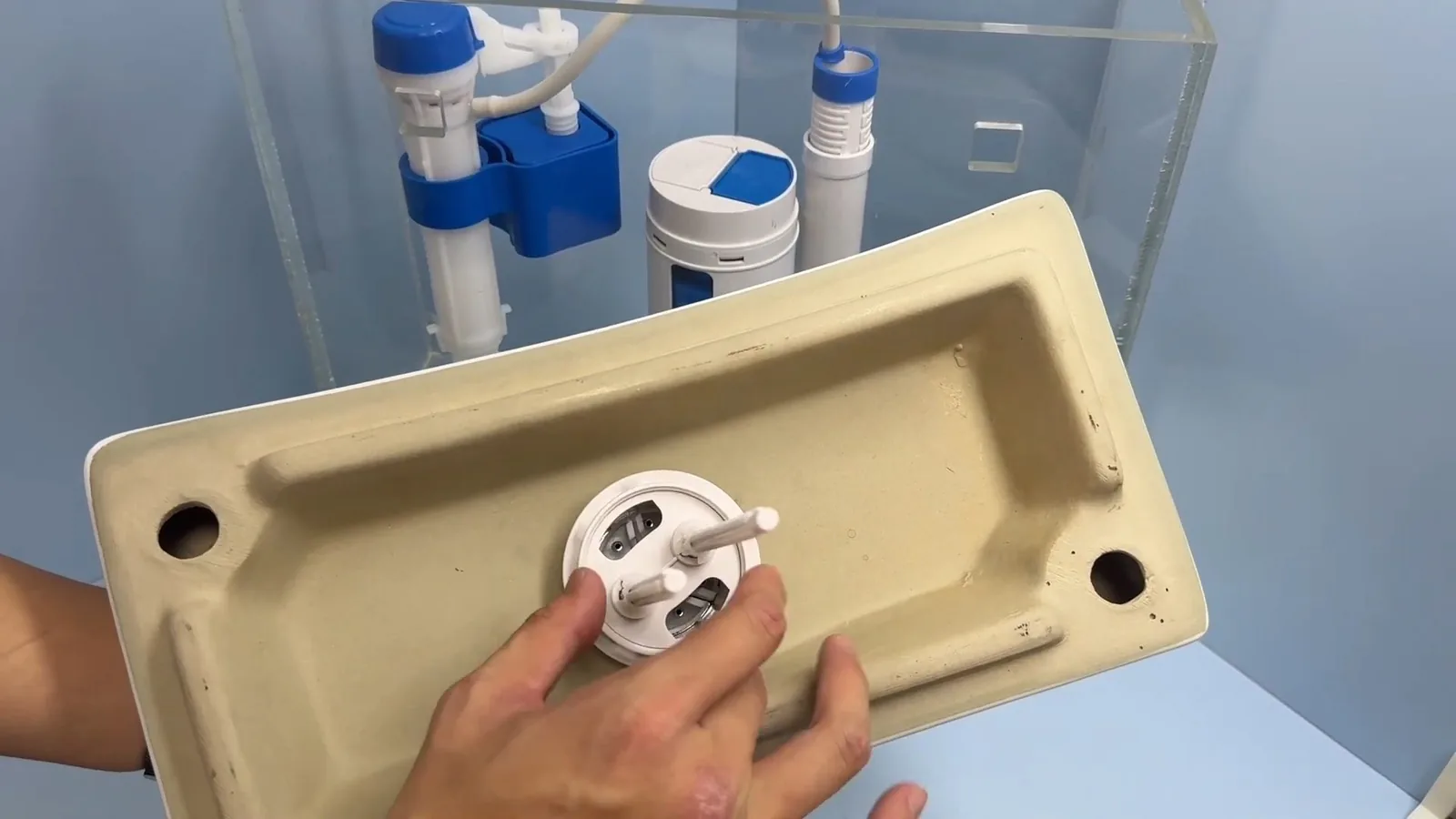 A new fill valve and flapper installed in a toilet tank during Toilet Repair & Installation service in Alpharetta
