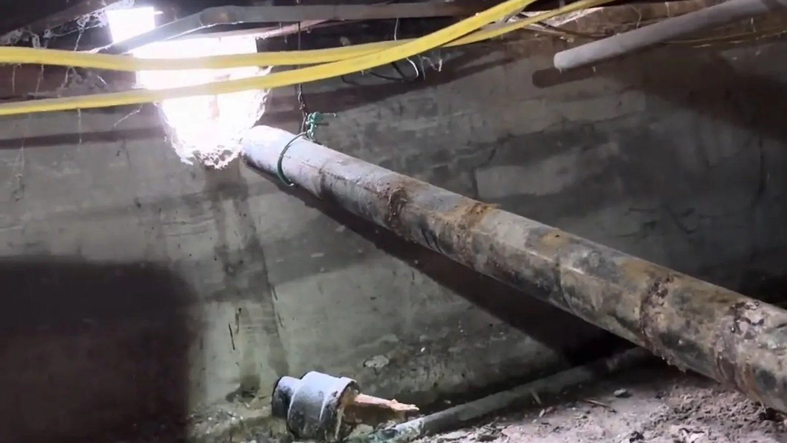 A cleanout added to a crawl space drain run, representing plumbing service in Downtown Alpharetta