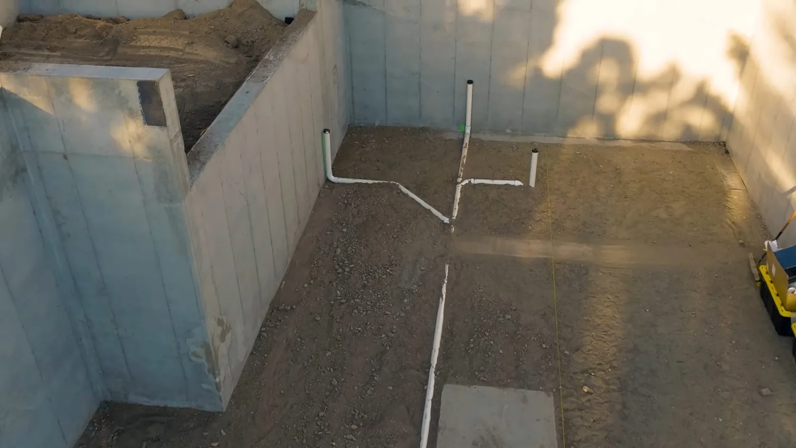 A drain line re-sloped and supported inside a crawl space on a plumbing call in Cumming, GA
