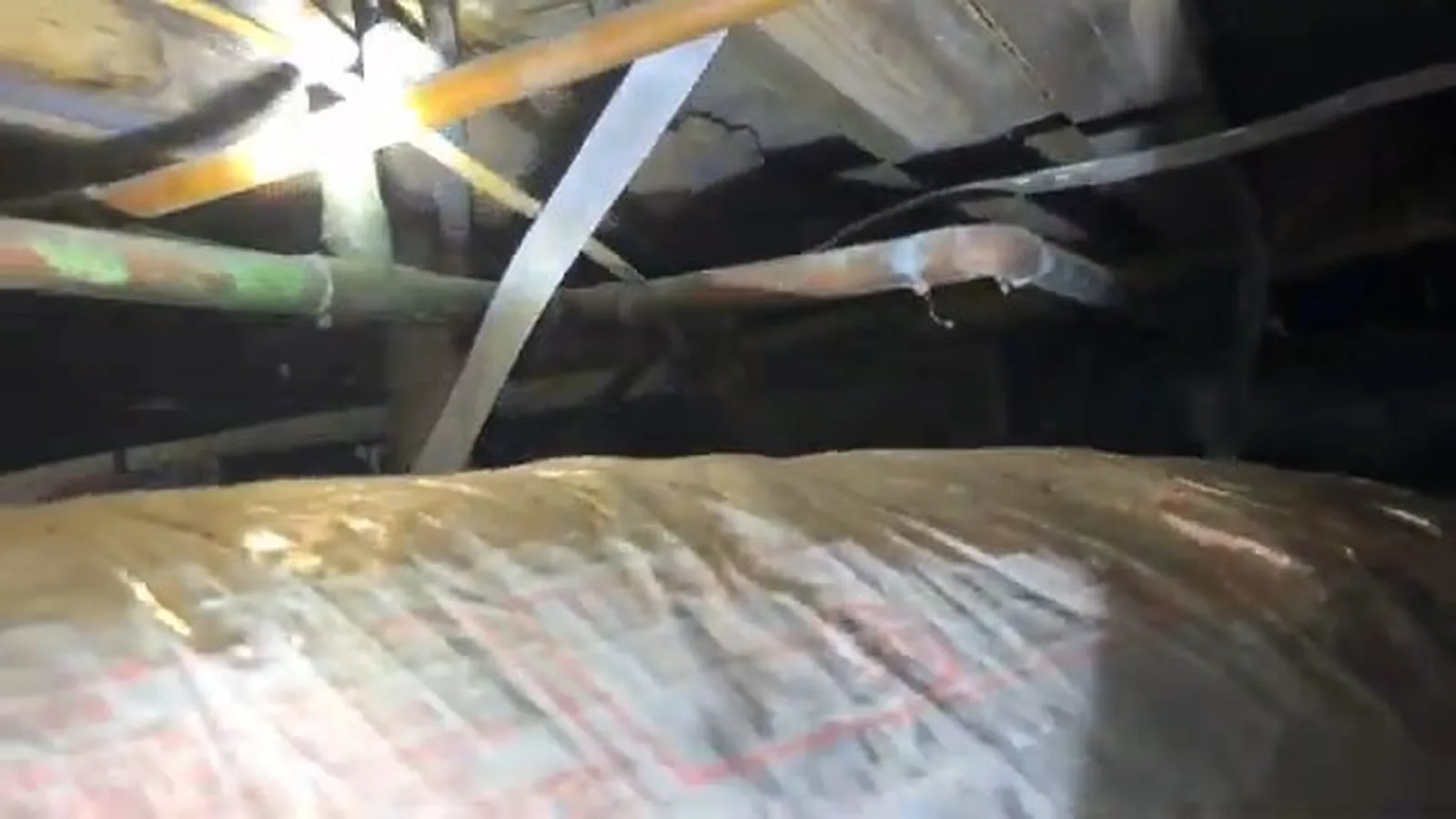 Standing water found under a house during a crawl space check during a service visit in Duluth, GA