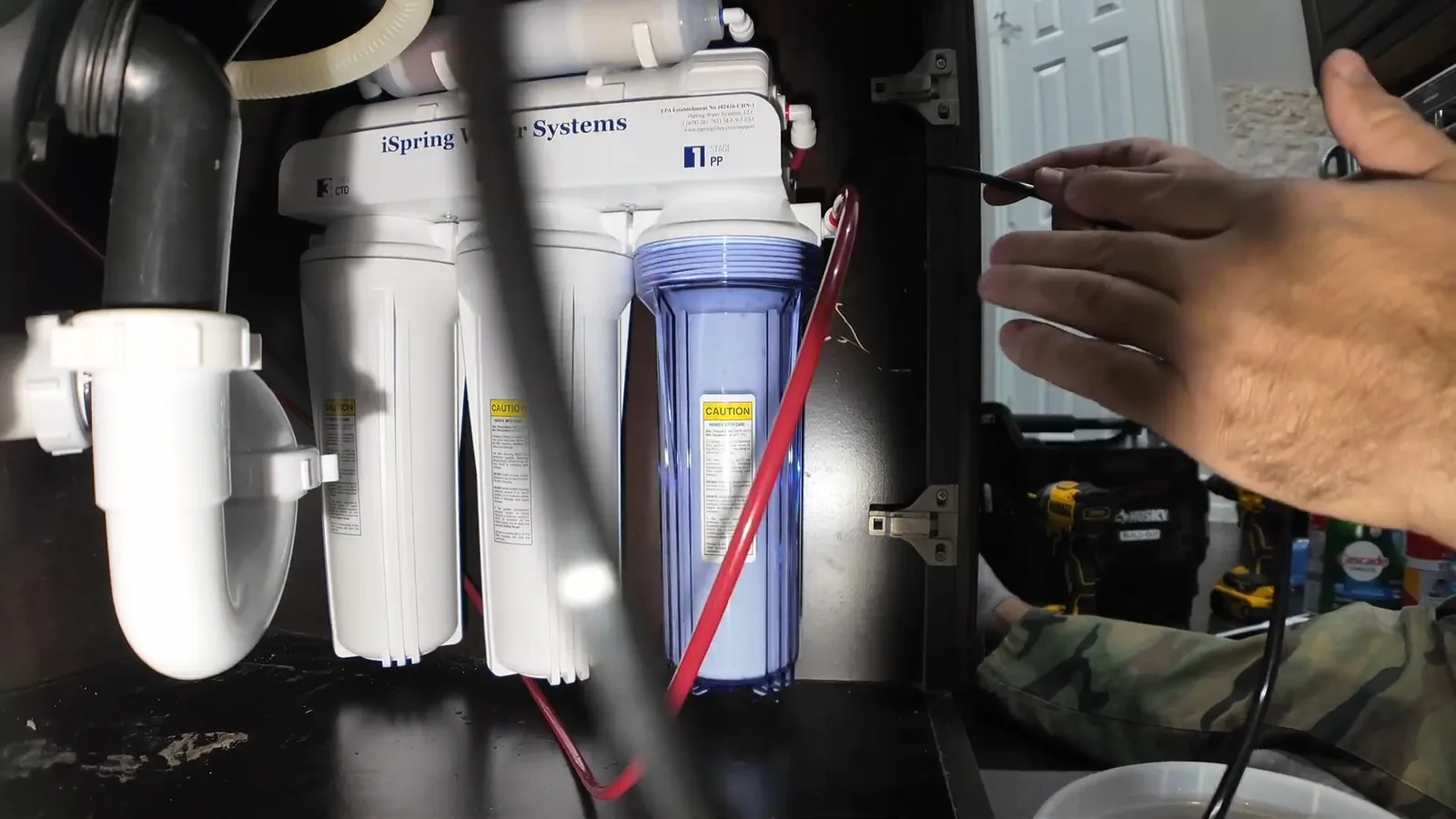 Replacement filter cartridges for a home filtration system during Water Filtration Installation service in Alpharetta
