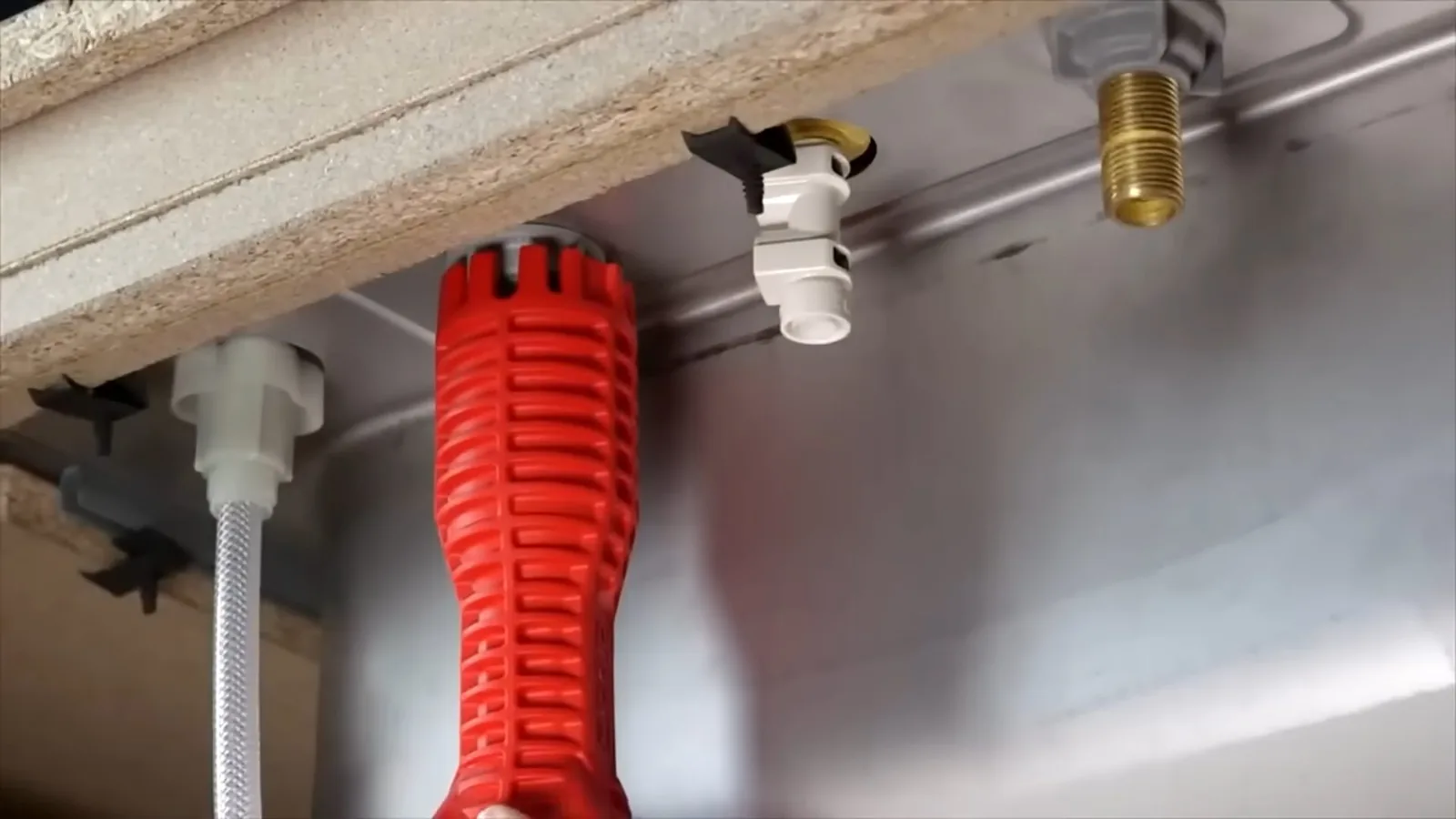Plumbing hand tools laid out on a work surface, related to Pinhole Leaks in Alpharetta Copper Pipes: Why 1980s–90s Homes Are Failing Now