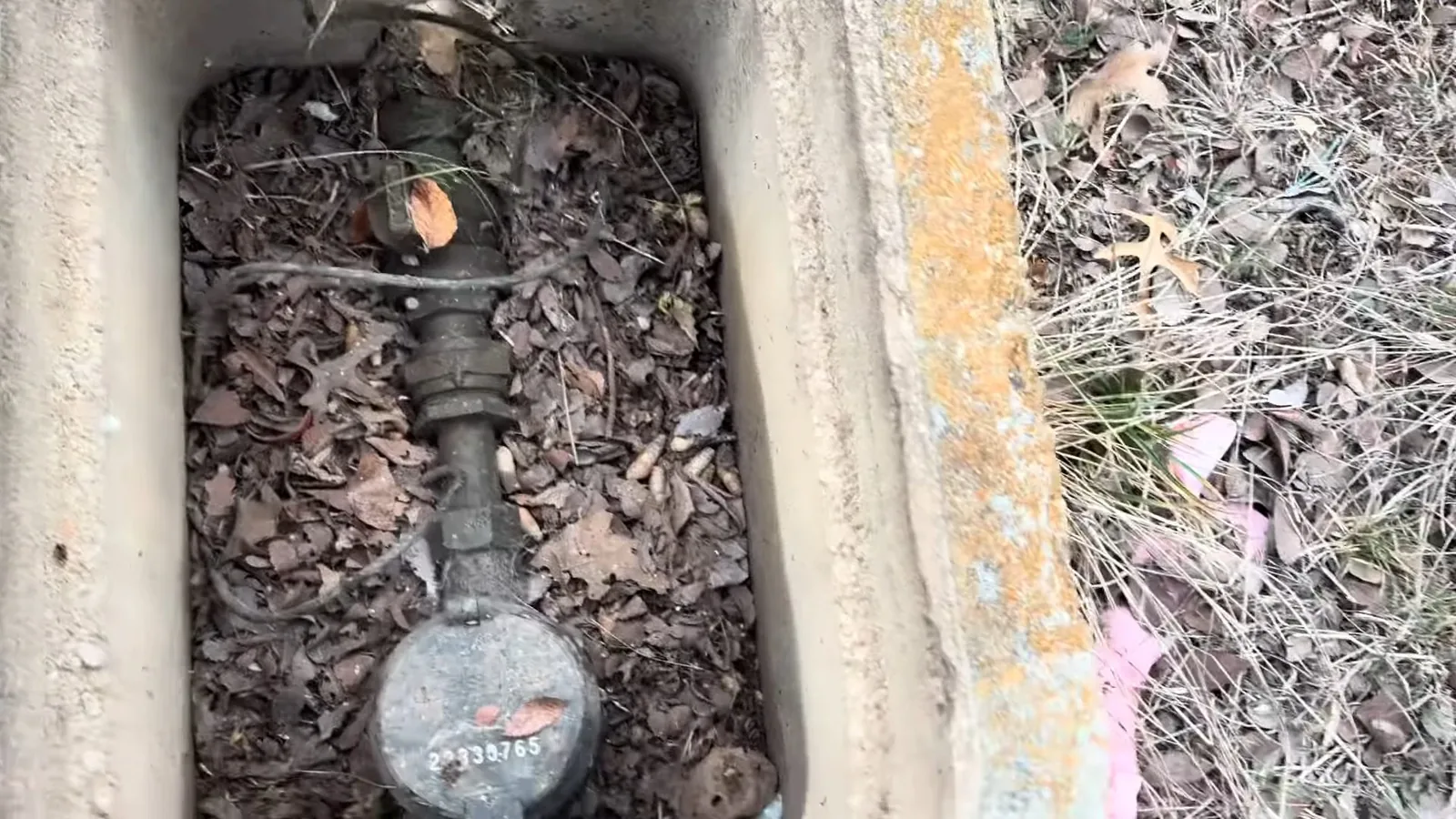 An outdoor hose bib with a cracked housing, illustrating index.html