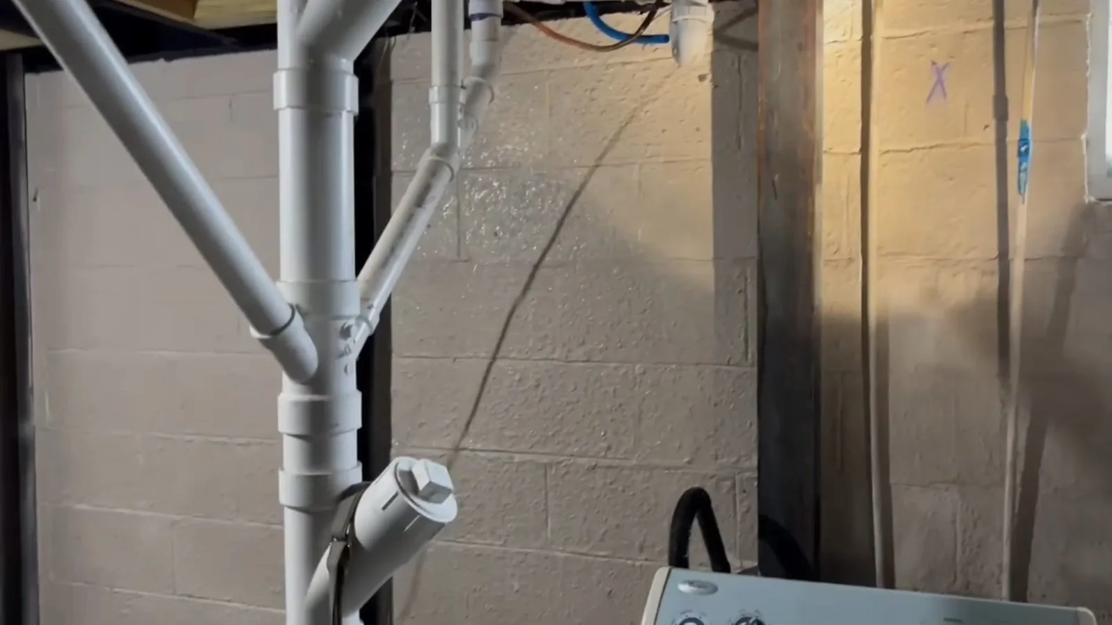 Ice buildup visible on an exposed supply line during Burst Pipe Repair service in Alpharetta