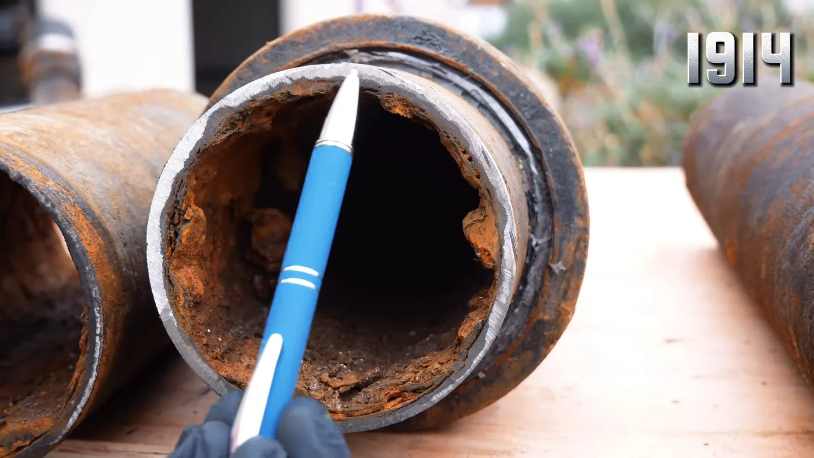 Cast iron pipe compared side by side with its PVC replacement, illustrating index.html