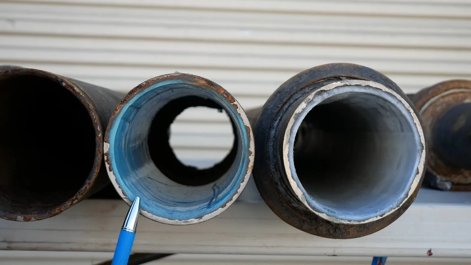 A cleanout plug stuck in an aging cast iron fitting during a service visit in Old Alpharetta