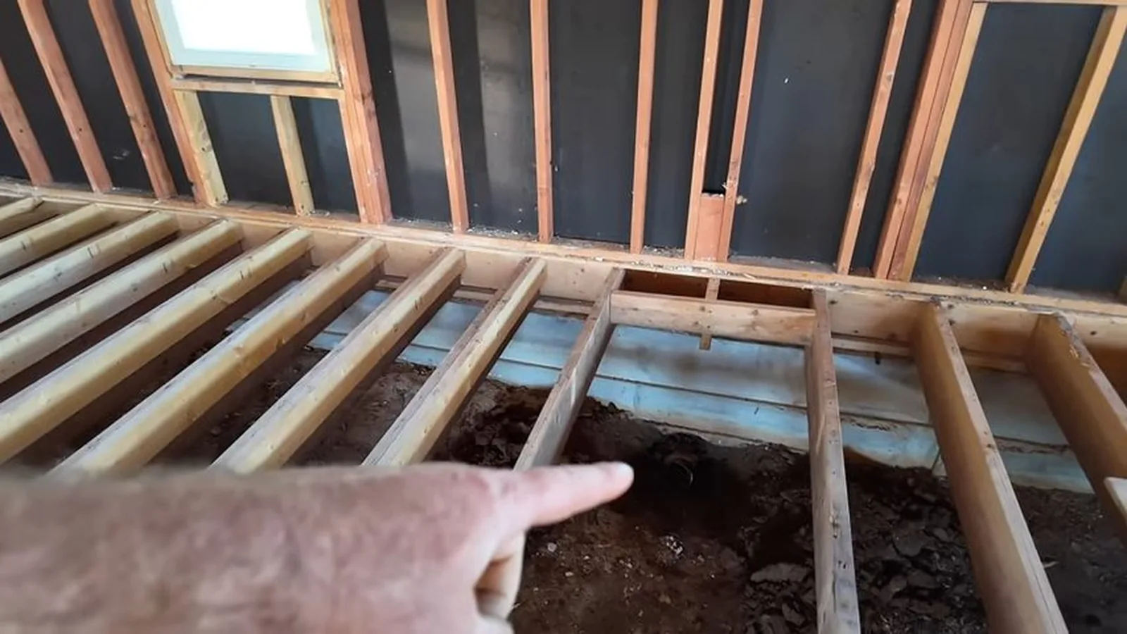 A length of replaced sewer pipe staged before backfill, related to Sewer Line Replacement questions homeowners ask