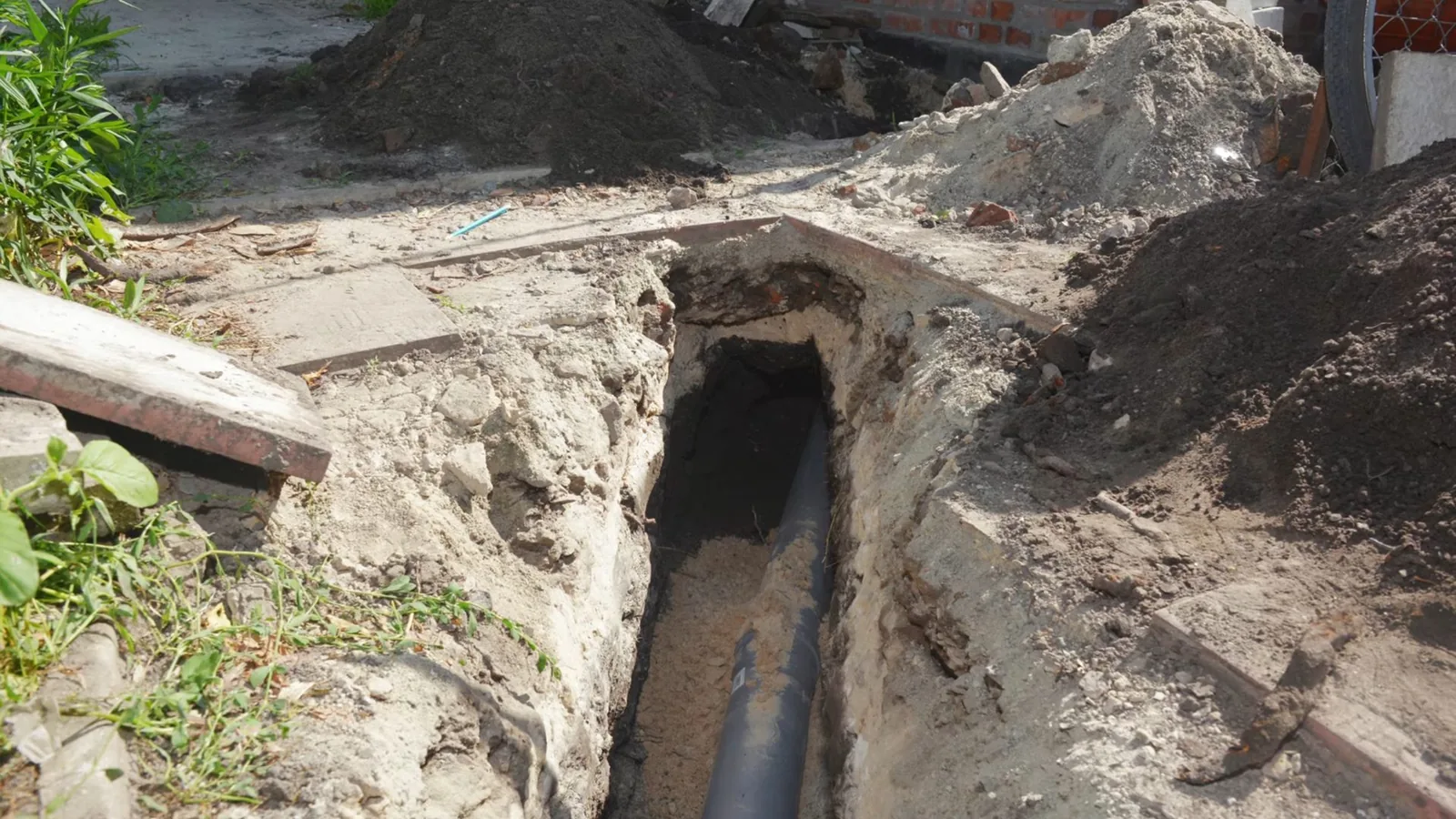 Roots cleared from inside a damaged sewer pipe, representing Sewer Line Repair service