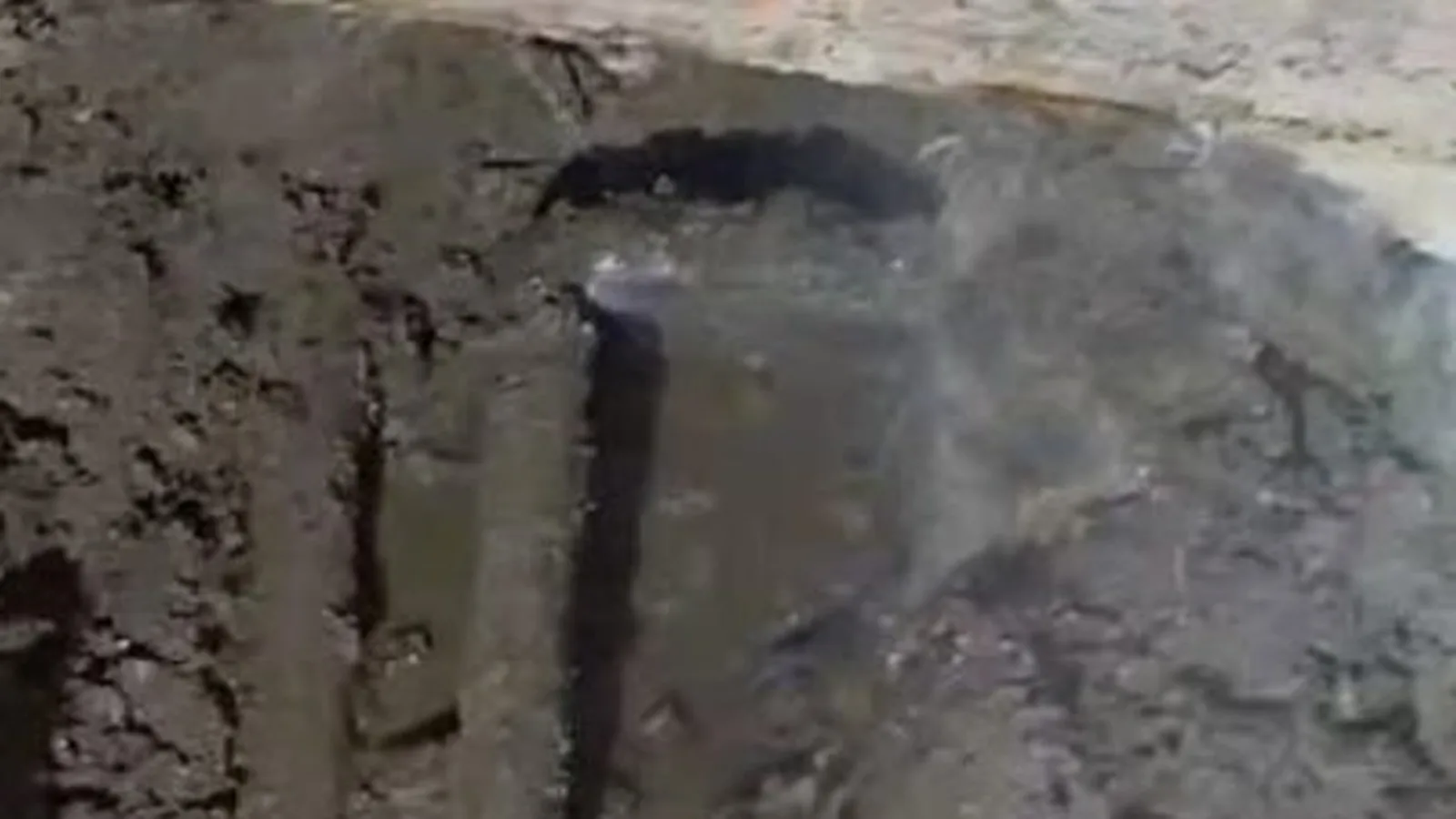 A jackhammer used to access a pipe under a slab floor, related to Slab Leak Detection & Repair questions homeowners ask