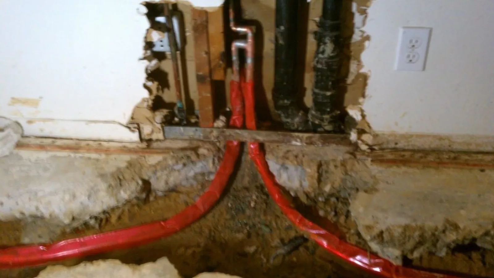 Corrosion visible on a water heater's inlet fitting during Water Heater Repair service in Alpharetta