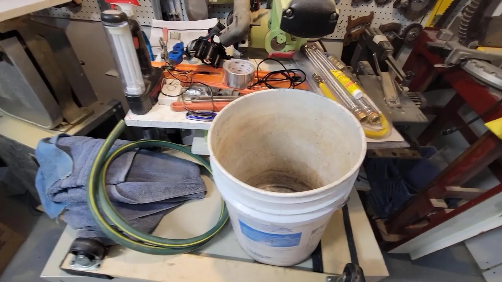 A water heater's cold and hot supply lines being connected during Water Heater Installation & Replacement service in Alpharetta