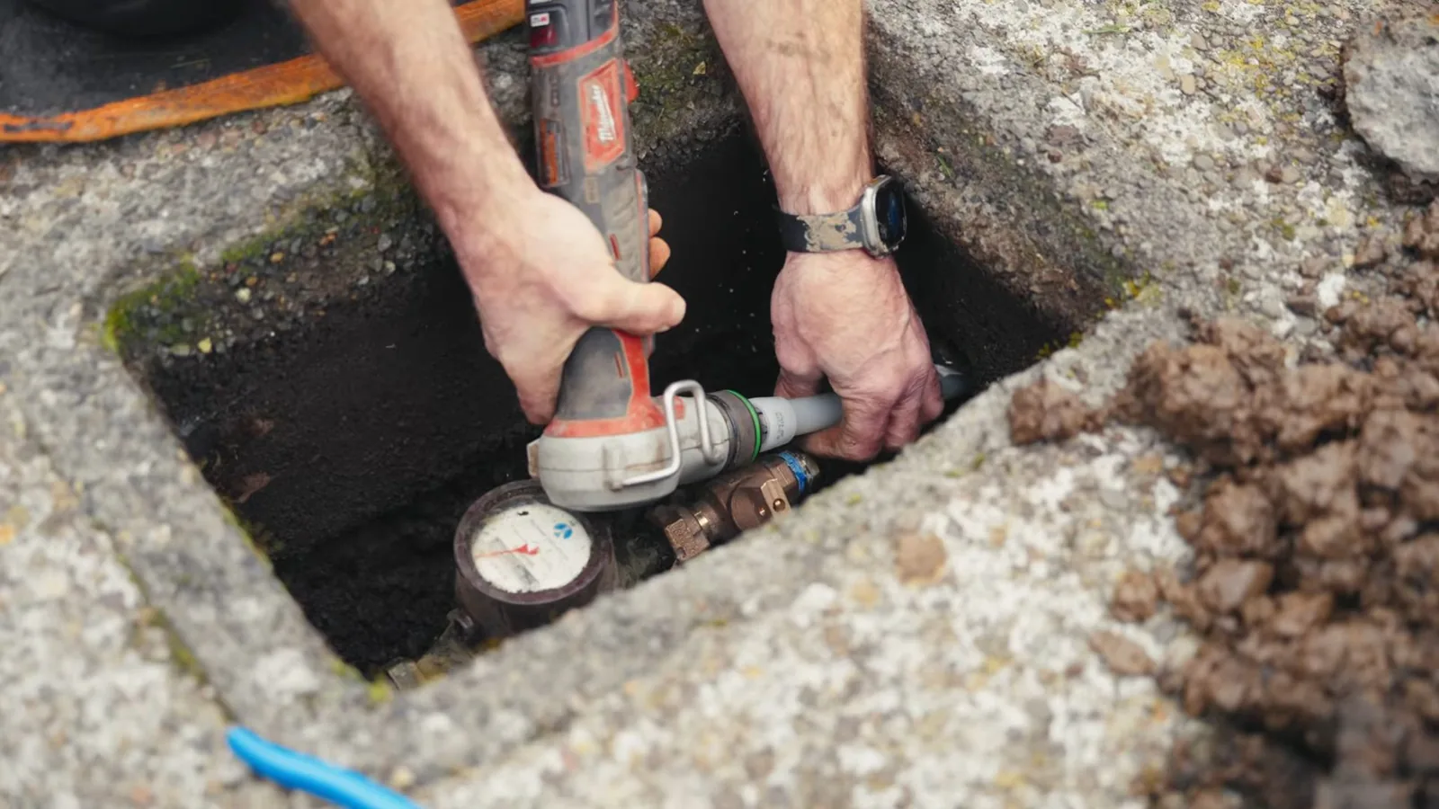 A section of repaired water line before backfill, related to Why Your Alpharetta Water Bill Spiked: And the Fulton County Leak Credit You Should Know About